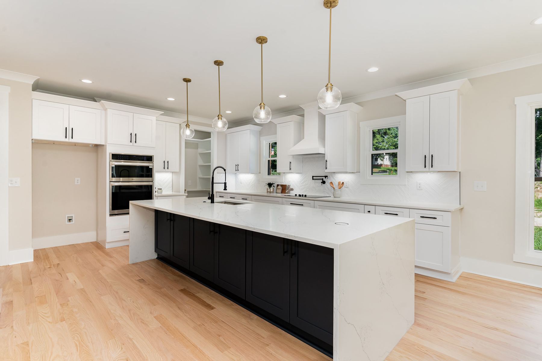 Kitchen with a waterfall-edge island